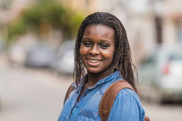 istock Portrait of smiling student 1358852916