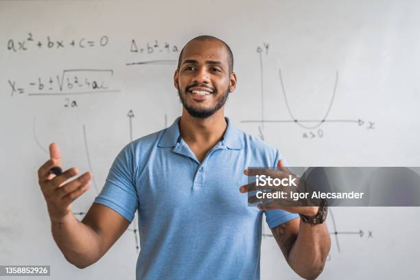 Math Teacher In The Classroom Stock Photo - Download Image Now - Teacher, Professor, Males