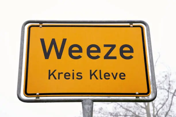 The street sign Weeze in the Kleve district in Germany. Close to the Dutch border.