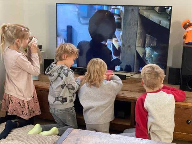 istock Children watching tv on Sinterklaas day 1358863947