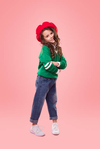istock Confident trendy girl with crossed arms 1358868190