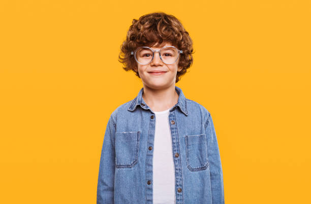 istock Happy smart boy in glasses 1358868205