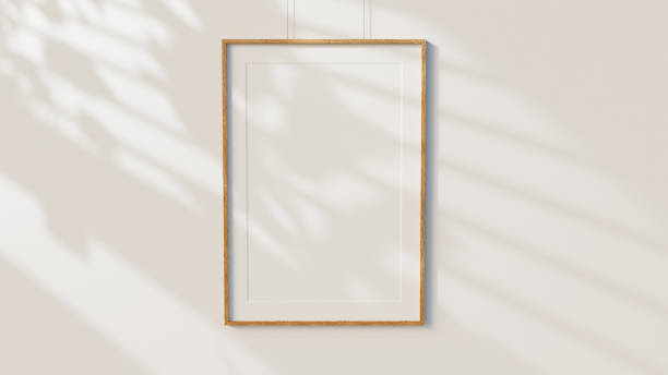 istock 3D Rendering Minimal blank wooden picture frames on white wall background 1358868783
