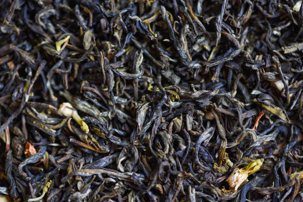 fond de thé sec chinois, thé au jasmin séché pour le thé infusé, thé noir à la feuille - jasmine tea black tea tea drink photos et images de collection