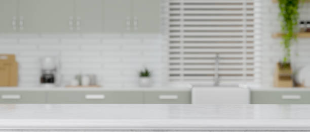 istock Modern white and clean kitchen interior with copy space on kitchen island 1358876073