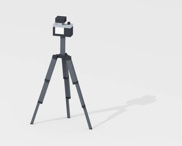 istock Digital camera, mirrorless camera with flashlight and metal steel tripod in black & white retro style 1358879786