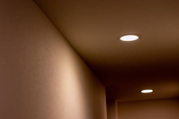 istock Small lights glowing on the ceiling in the hall 1358882516