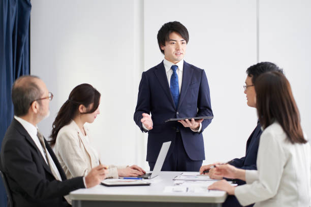 istock Asian businessman explaining at a meeting 1358885764