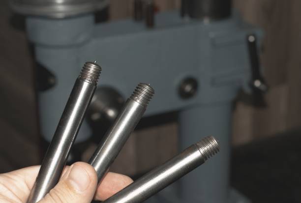 istock Close up of a thread on the handle of a drilling machine. 1358890404