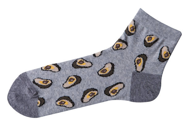 istock gray socks with a pattern of halved avocado, on a white background 1358901907