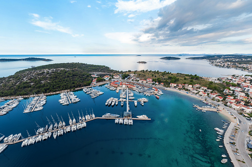 Aerial view of Marina Frapa Rogoznica, Croatia. Beautiful yachts, catamarans and sailing ships in the Marina in the early morning