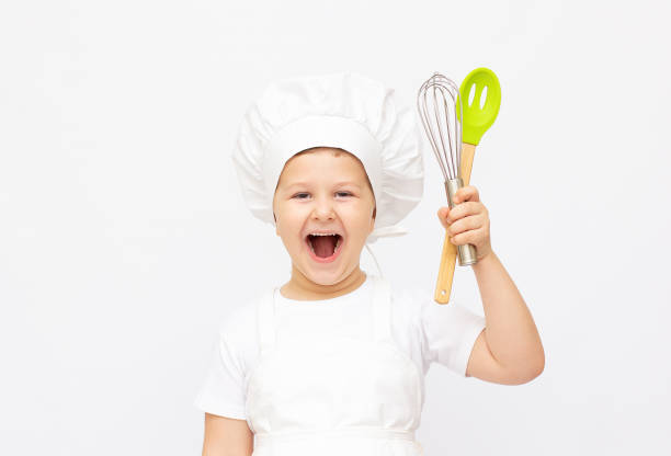 the little boy in a suit of the cook - child prodigy imagens e fotografias de stock