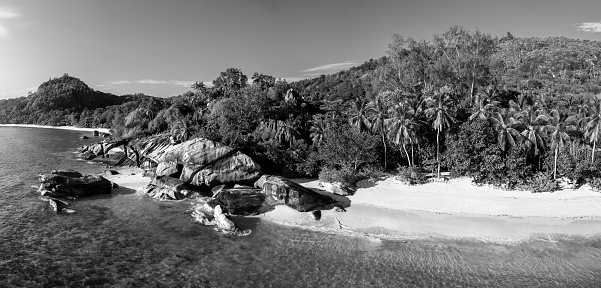Seychelles Baie Lazare Mahe Island Black and White Photo Panorama. Beautiful Baie Lazare Beach and Lagoon, Stiched XXXL Panorama, Drone point of view along the Mahe lsland Beach, Rocks and crystal clear Ocean. Baie Lazare, Mahé Island, Seychelles Islands, Africa