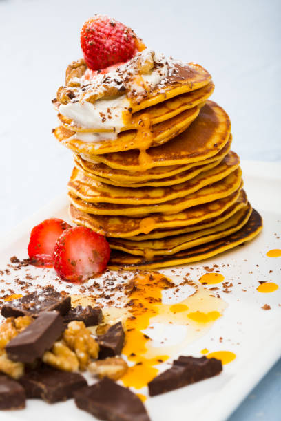 istock Pumpkin pancakes with sauce 1358909167