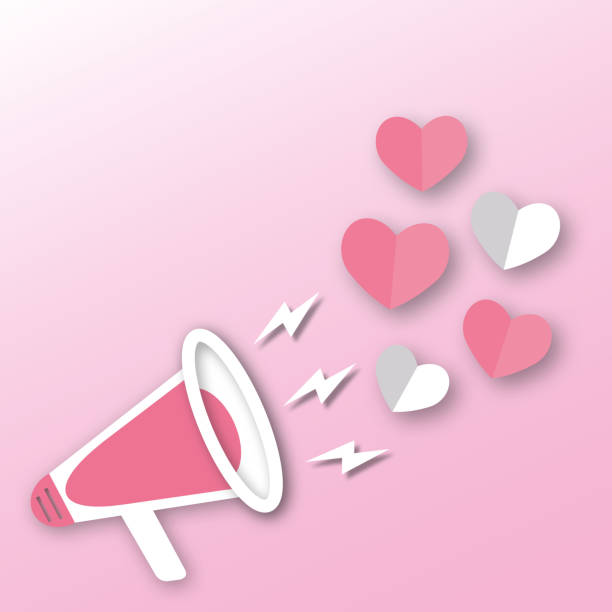 istock Megaphone with hearts and flash light on pink background. Greeting card for Valentine or Wedding. 1358911151