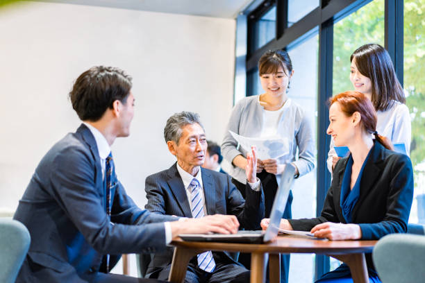 istock Businesspersons having a meeting in an office 1358911303