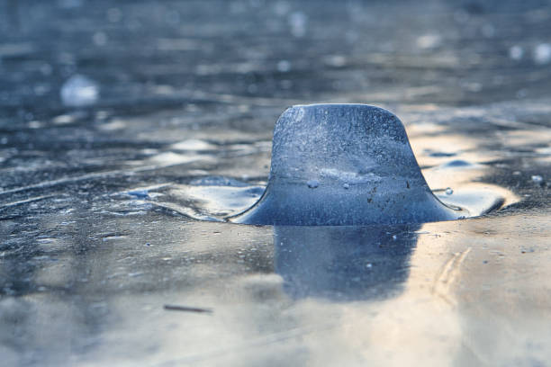 istock Ice pieces on a lake at sunset in winter atmosphere 1358911423