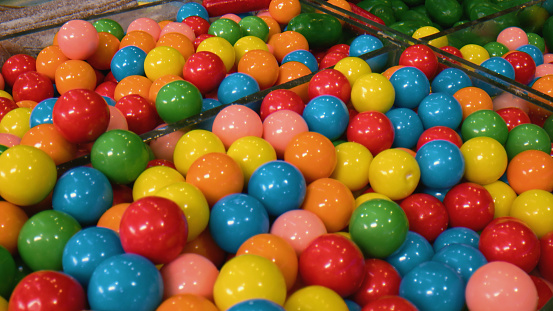 Colorful  round gum balls sweets in glass boxes