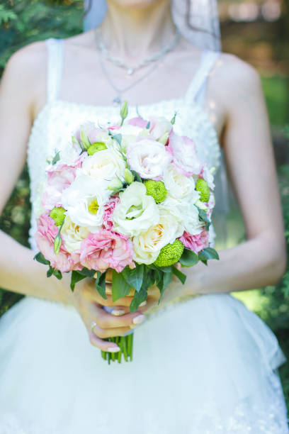 istock Bouquet with roses, eustoma or lisianthus and Santini Chrysanthemums 1358918989