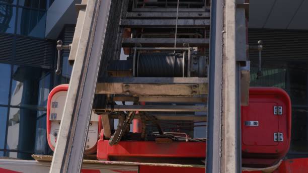 istock Close up view of lifting winch platform for construction 1358919241