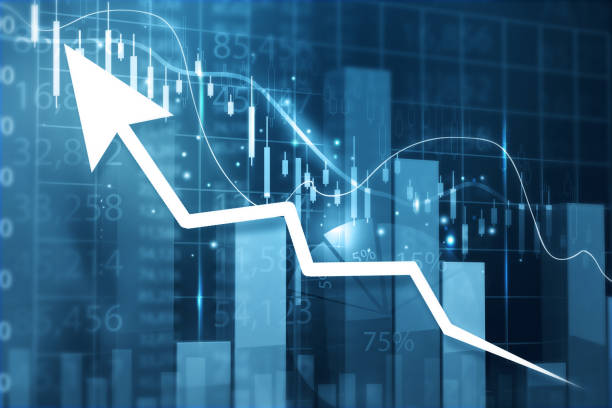 istock Moving arrow on stock market graph chart 1358921757