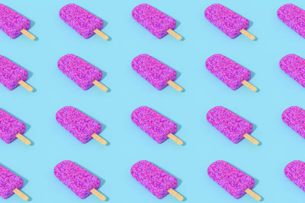 istock Ice cream stick, popsicle, sugar sprinkles, minimal summer concept, blue color background 1358923492