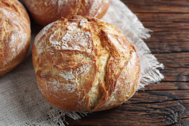 istock Small loaves of bread 1358923627
