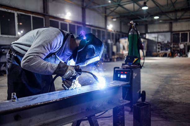 istock Industrial Welder With Torch 1358926496