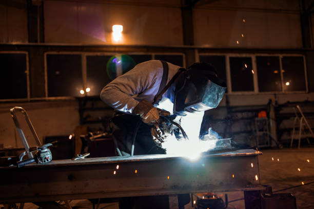 istock Industrial Welder With Torch 1358926704