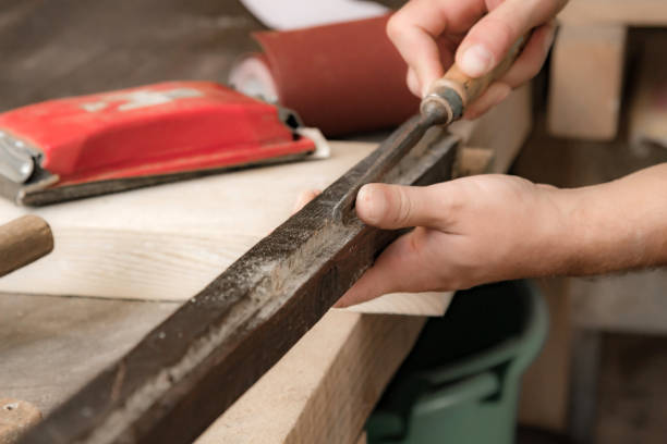 istock Man assembling furniture and fixing it - hobby garage concept. 1358927899