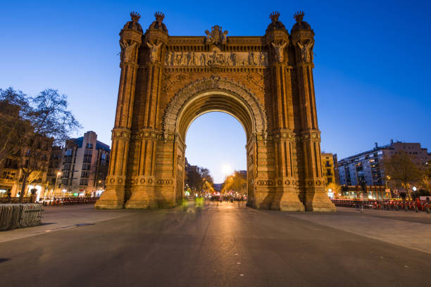 Triumph Arch in Barcelona at dusk Triumph Arch (Arc de Triomf) of Barcelona was built in 1888. Night photo. Catalonia, Spain arc de triomf barcelona stock pictures, royalty-free photos & images