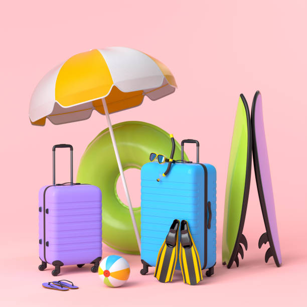 istock Suitcase with beach umbrella and surf board on pink background. 1358928646