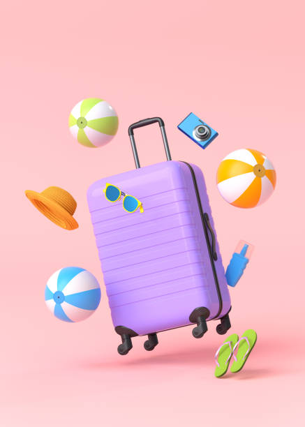 istock Colorful suitcase or baggage with beach accessories on pink background. 1358928655