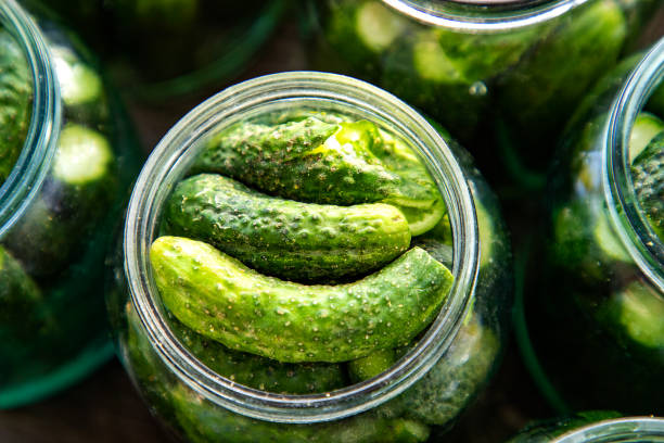 istock pickles cucumbers in glass jars 1358932501