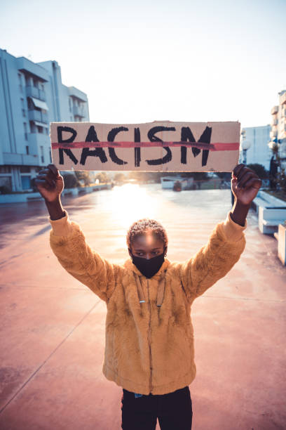 istock Social equality - Woman stands for equal rights 1358934111