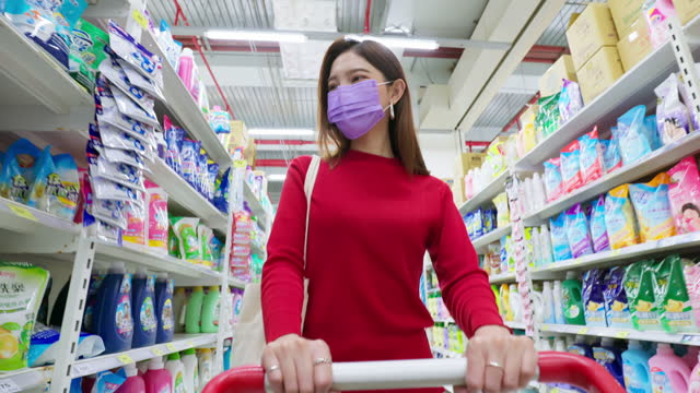 woman buy cleaning supplies