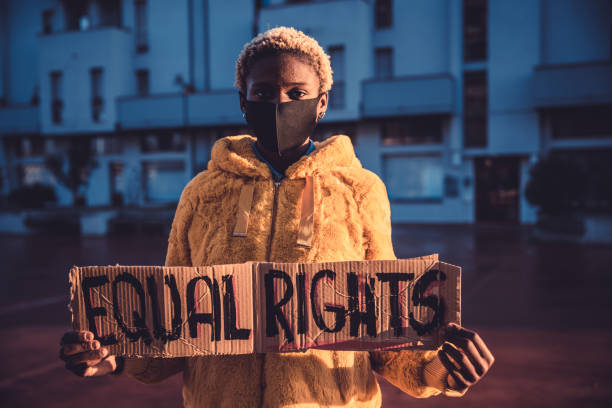 istock Social equality - Woman stands for equal rights 1358935755