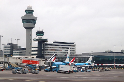 ATC towers at Schiphol Airport in Amsterdam. Schiphol is the 12th busiest airport in the world with more than 63 million annual passengers.
