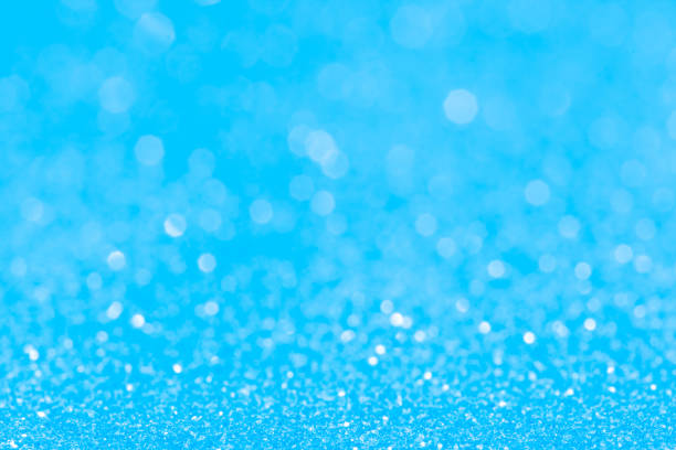 istock sparkles of Blue glitter abstract background. Copy space 1358941775