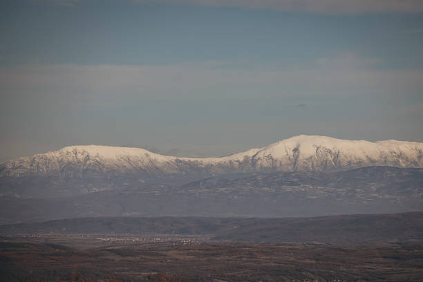 Landscape view on the mountain top covered with snow