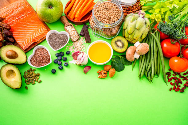 istock healthy food on green background. Copy space 1358945490