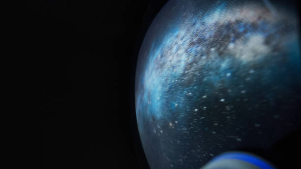 istock Looking for New Earth. African ethnicity man exploring Space, travelling through bright cosmic dust 1358947277