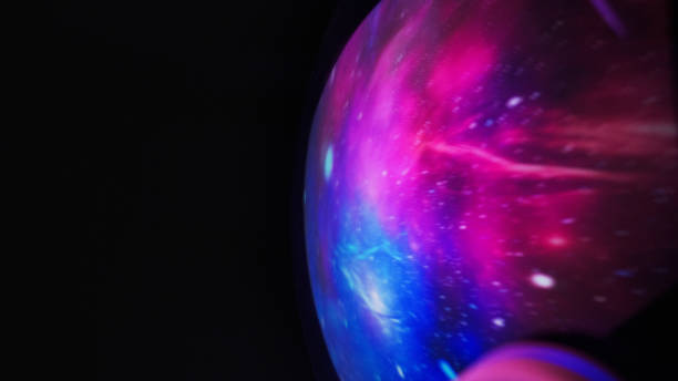 istock Looking for New Earth. Man exploring Space. Travelling through multi colored Nebula. Flashes in the eyes and helmet visor 1358947324