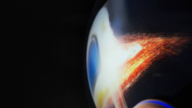 Young man looking at breathtaking view. Black Hole reflecting in helmet visor. Close up on eyes