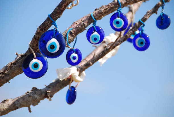 istock Cappadocia, Turkey. Turkish eyes, stuck in dry branches. 1358948047