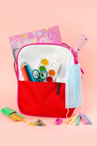 istock Back to school concept, backpack full of school supplies 1358948182