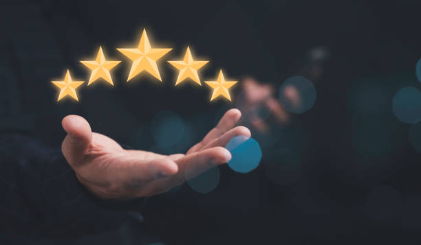 istock Customer satisfaction and product service evaluation concept , Hand holding  five stars with copy space. 1358950579