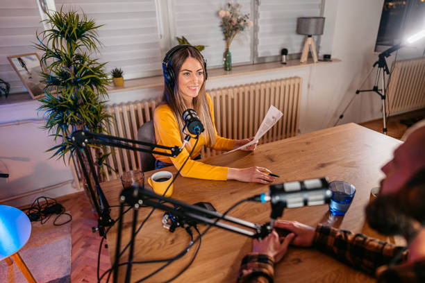 istock Podcast host and guest recording interview 1358950802