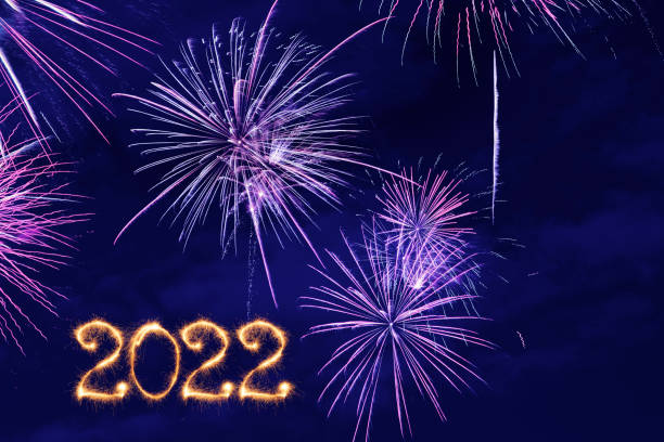 istock Sparkling New Year 2022 with fireworks 1358951426