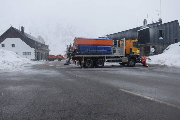 istock Snowplow machine on the border with France 1358951522